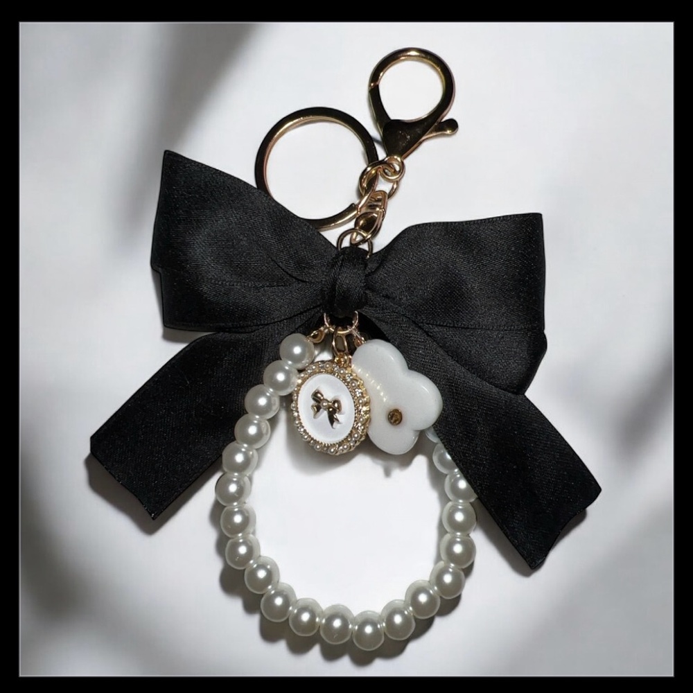 CC LOGO STAMPED  Black and White Key Chain Bag Charm With Bow and Pearl Accents🖤 - Picture 3 of 5
